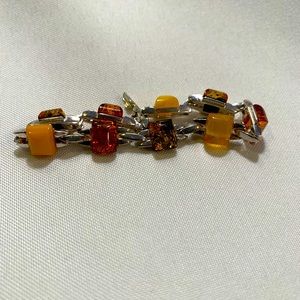 Silver link, yellow/green/amber stone bracelet. Sterling silver clasp
